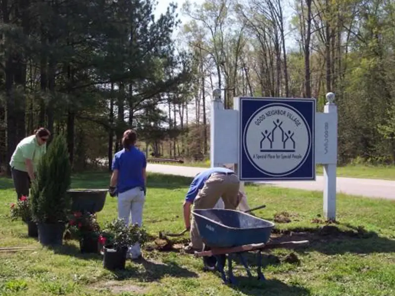 Employees doing grounds improvement work