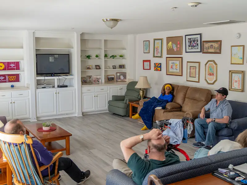 Residents relaxing and socializing in living room